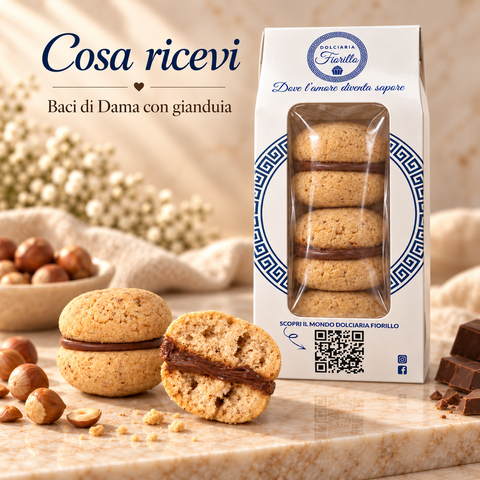 Cosa ricevi: confezione Dolciaria Fiorillo con Baci di Dama con gianduia e prodotto in primo piano.
